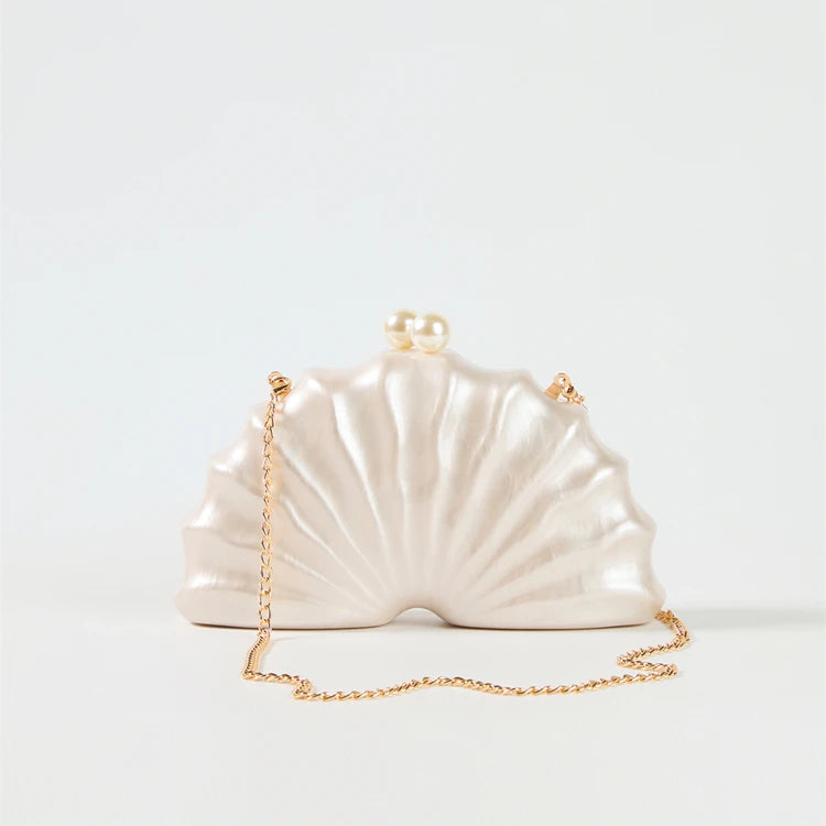 Chic Summer Nautilus Pearl Shell Clutch Bag with gold chain strap by Montipi Australia