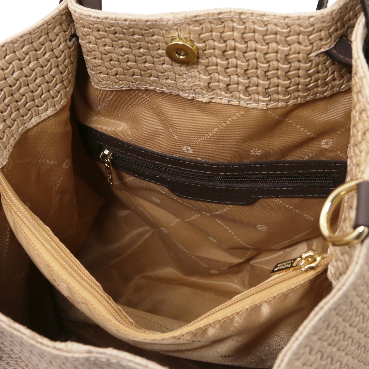Close up of the Luxurious large organised compartment with beige interior and multiple internal zipped pockets and side pockets of the TL Keyluck Tote Bag in beige leather by Montipi Australia versatile convenient and durable with luxurious beige fabric signature of premium designer bag