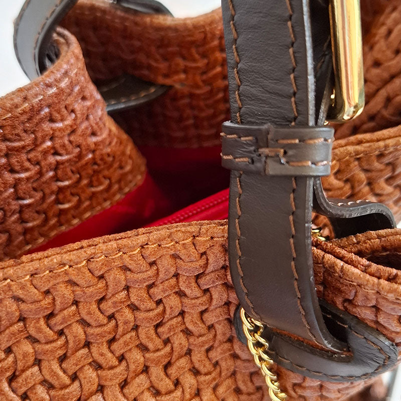 Close up of the meticulously handcrafted finish of the premium leather handles of the TL Keyluck Tote Bag in cognac leather by Montipi Australia