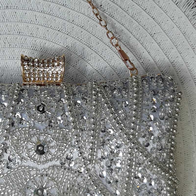 Luxe Silver Wedding Clutch Bag with intricate silver beaded design and silver sequin with removable chain strap by Montipi Australia
