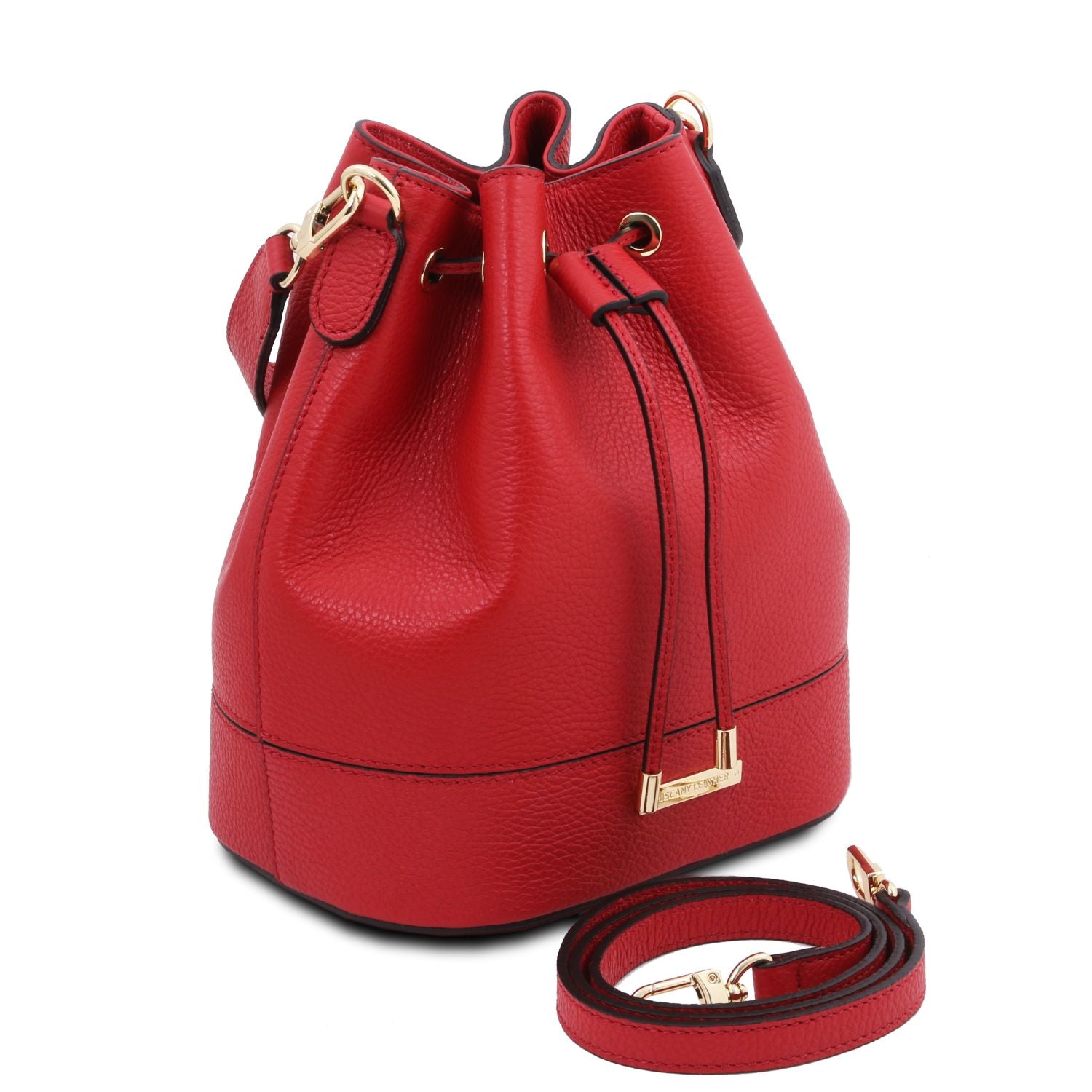 Angled view of the TL Leather Bucket Bag in red by Montipi Australia, showcasing its premium Italian pebbled leather, structured silhouette, and elegant drawstring closure with gold-tone hardware. A versatile handbag with a detachable top handle and adjustable shoulder strap, designed for everyday sophistication and effortless style.