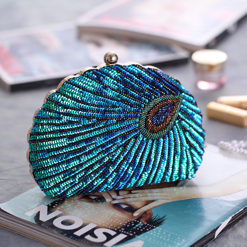 Teal Sequin Peacock Clutch with detailed beadwork design in feather shape, unique statement clutch bag elegant whimsical eclectic chic style by Montipi Australia