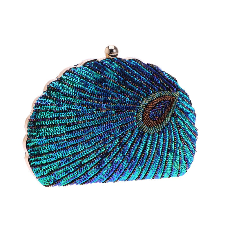 Close up on Teal Sequin Peacock Clutch with detailed beadwork design in feather shape, unique statement clutch bag elegant whimsical eclectic chic style by Montipi Australia