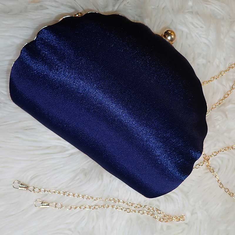 Close up on Teal Sequin Peacock Clutch with elegant silky back in dark blue to protect your dress, provided with two chain straps for versatile styles, unique statement clutch bag elegant whimsical eclectic chic style by Montipi Australia