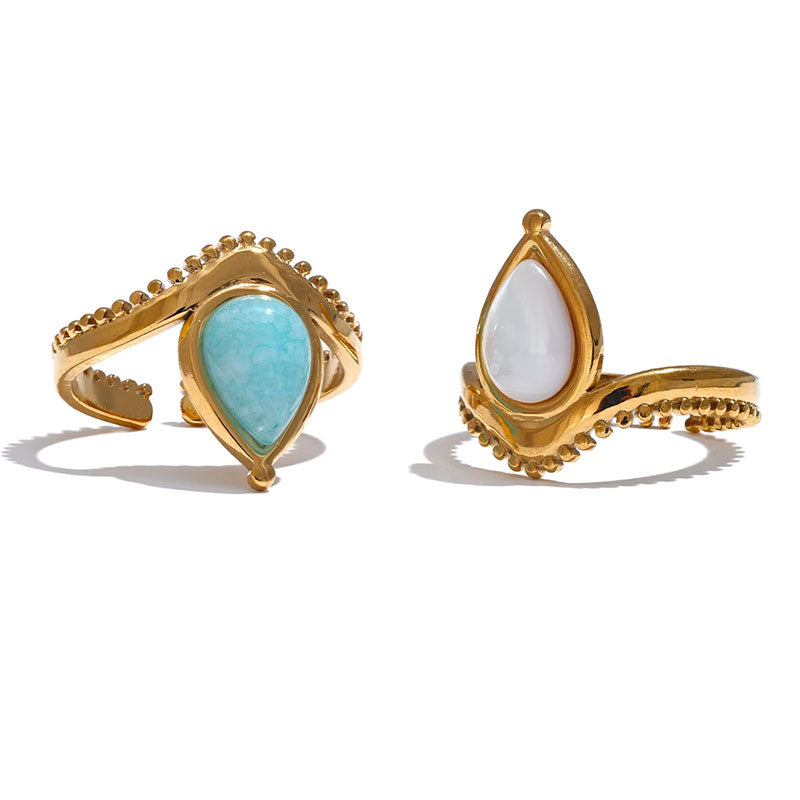 Gold rings with turquoise and white mother-of-pearl teardrop stones – Amara Gemstone Rings by Montipi.