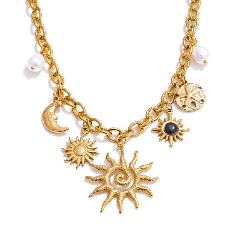 Golden sun and moon charm necklace with pearls – Aurea Sun Charm Necklace by Montipi.