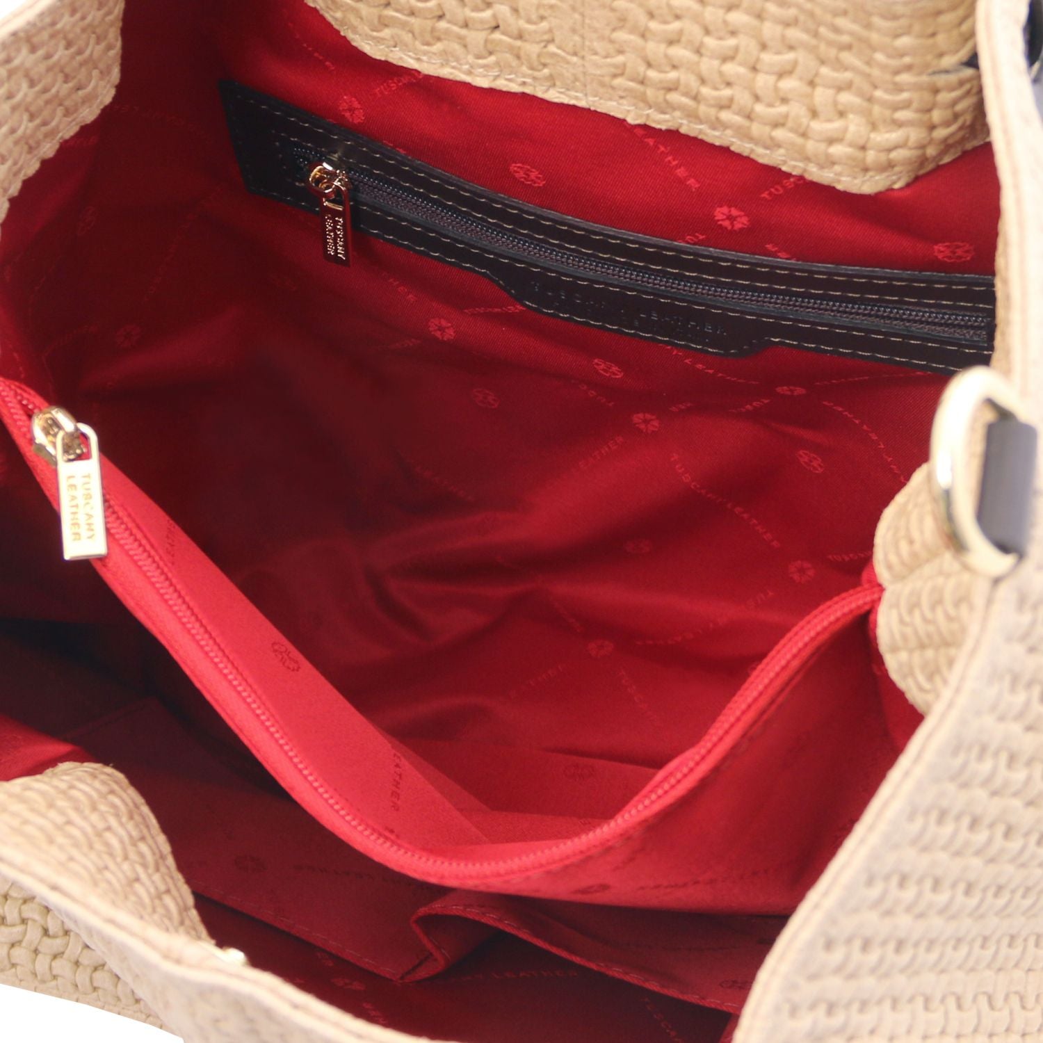 Close up of the Luxurious large organised compartment with red interior and multiple internal zipped pockets and side pockets of the TL Keyluck Tote Bag in beige leather by Montipi Australia versatile convenient and durable with luxurious red fabric signature of premium designer bag