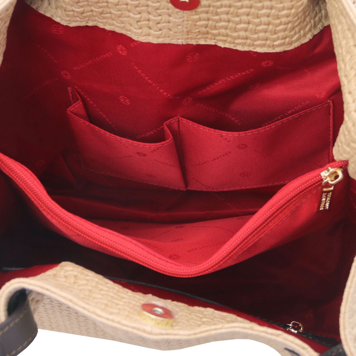 Close up of the Luxurious red interior with large organised compartment with central internal zipped pocket and side pockets of the TL Keyluck Tote Bag in beige leather by Montipi Australia smart and convenient design to organise and quickly access all your essentials with luxurious red fabric signature of premium designer bag