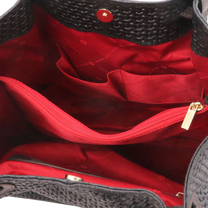 Close up of the Luxurious red interior with large organised compartment with central internal zipped pocket and side pockets of the TL Keyluck Tote Bag in black leather by Montipi Australia smart and convenient design to organise and quickly access all your essentials with luxurious red fabric signature of premium designer bag
