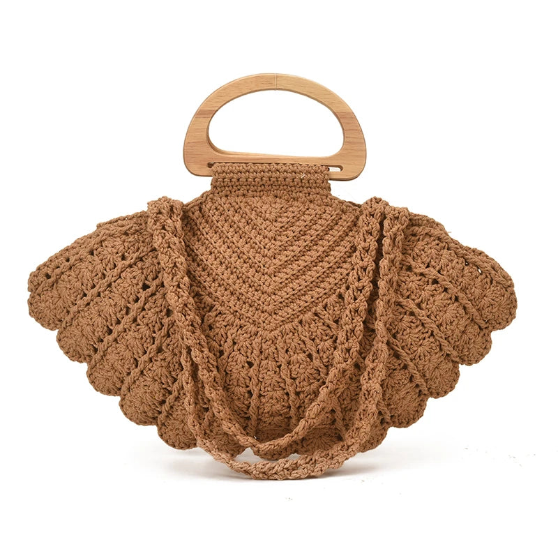 Crochet Shell Boho Bag in brown tan colour featuring a woven shell shape with elegant wooden handle & refine coastal chic silhouette with a boho feel by Montipi.