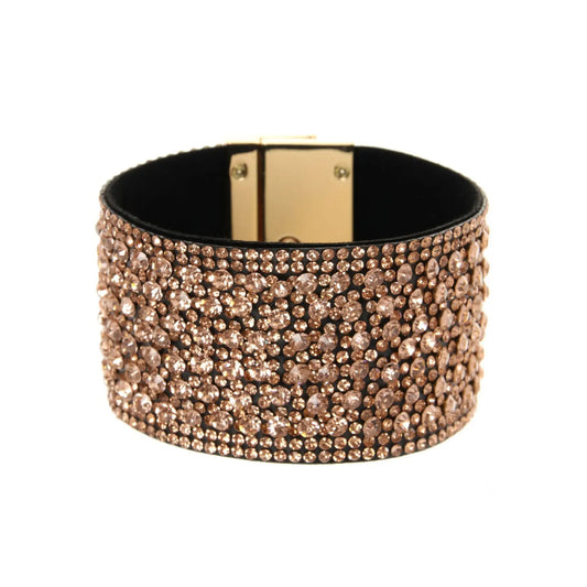 Close-up of the Crystal Dust Cuff Bracelet in rose gold – a wide rhinestone cuff with sparkling detail, gold hasp closure, and bold boho luxe appeal.