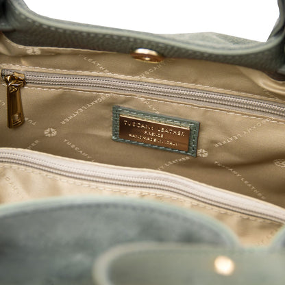 luxury TL logo in gold engraved details on Diade green suede leather shoulder bag