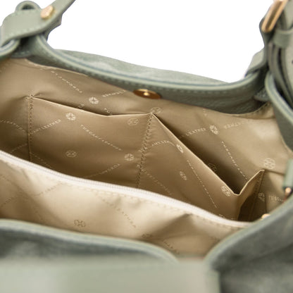 Green suede leather handbag interior with zip pocket and open compartments