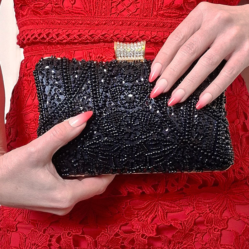 Elegant-Black-Beaded-Evening-Clutch-Bag_with red evening dress and stylish Pink-Red-Ombre-Nails-by-Montipi-Australia