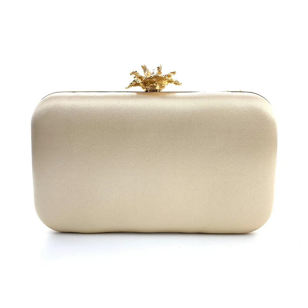 Elegant clutch bag with floral and beaded design with pearls and sequins with gold hasp a chic and dreamy statement bag to dress up for wedding or celebrations by Montipi Australia