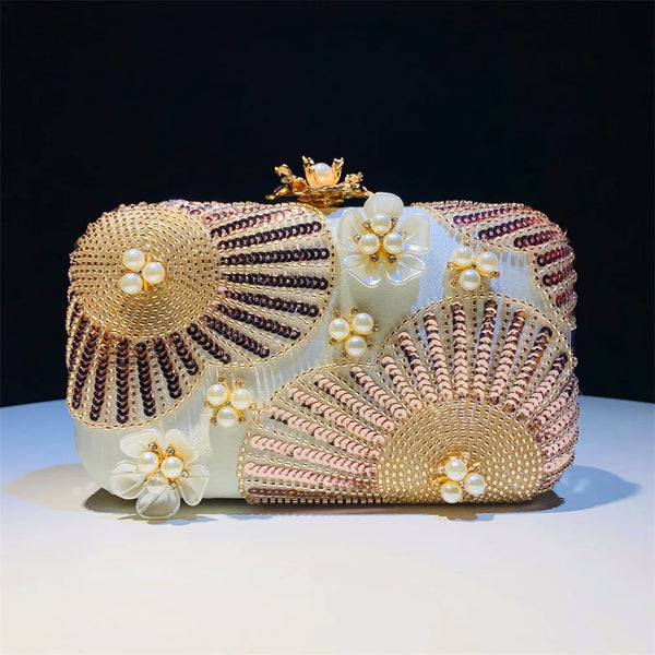 Elegant clutch bag with floral and beaded design with pearls and sequins with gold hasp a chic and dreamy statement bag to dress up for wedding or celebrations by Montipi Australia