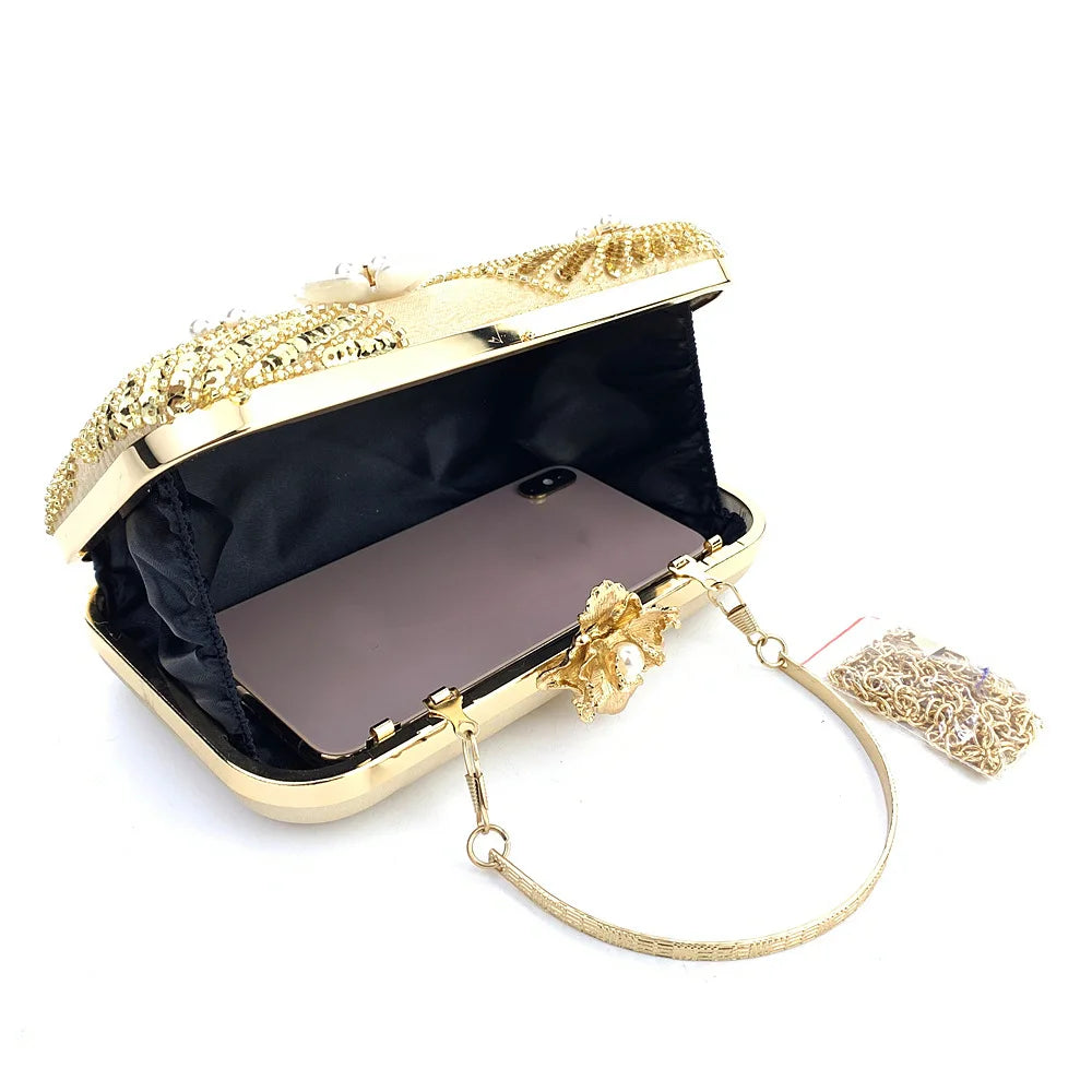Elegant clutch bag with floral and beaded design with pearls and sequins with gold hasp a chic and dreamy statement bag to dress up for wedding or celebrations by Montipi Australia