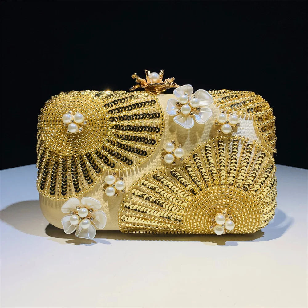 Elegant clutch bag with yellow floral and beaded design with pearls and sequins with gold hasp a chic and dreamy statement bag to dress up for wedding or celebrations by Montipi Australia