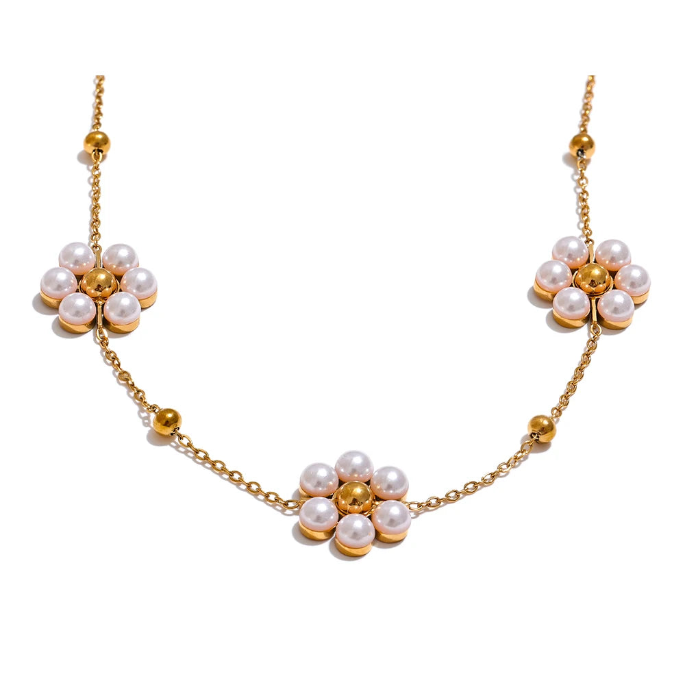 Gold necklace with pearl flower charms – Fiorina Pearl Flower Necklace by Montipi.