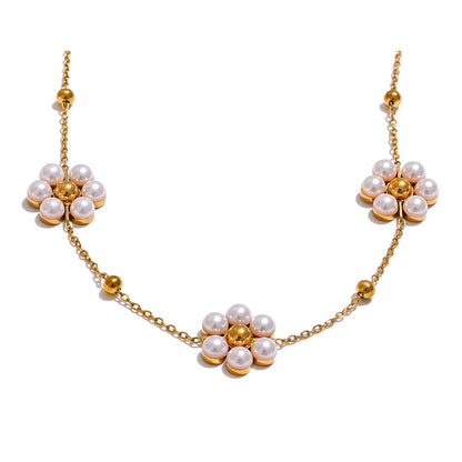 Gold necklace with pearl flower charms – Fiorina Pearl Flower Necklace by Montipi.