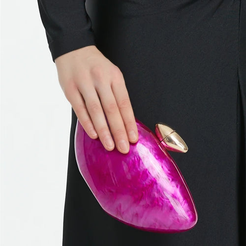 Hot pink seashell clutch bag with a dreamy pearl acrylic finish, gold hasp closure, and chain strap – perfect for weddings, soirées, and beachside style by Montipi Australia