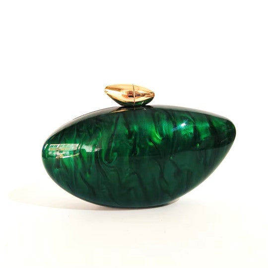 Vibrant green seashell clutch bag with a dreamy pearl acrylic finish, gold hasp closure, and chain strap – perfect for weddings, soirées, and beachside style by Montipi Australia