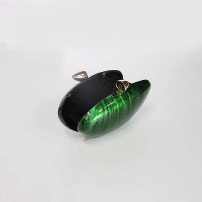 Vibrant green seashell clutch bag with a dreamy pearl acrylic finish, gold hasp closure, and chain strap – perfect for weddings, soirées, and beachside style by Montipi Australia