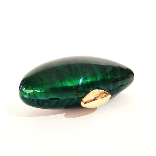Vibrant green seashell clutch bag with a dreamy pearl acrylic finish, gold hasp closure, and chain strap – perfect for weddings, soirées, and beachside style by Montipi Australia