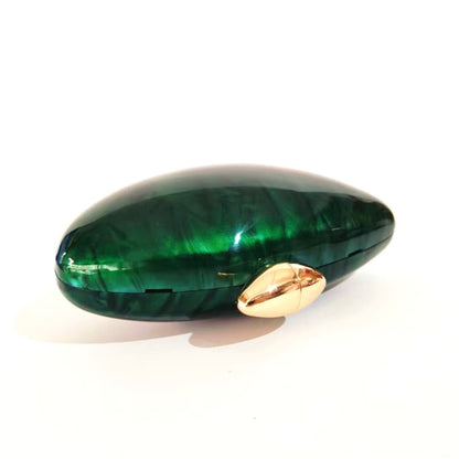 Vibrant green seashell clutch bag with a dreamy pearl acrylic finish, gold hasp closure, and chain strap – perfect for weddings, soirées, and beachside style by Montipi Australia
