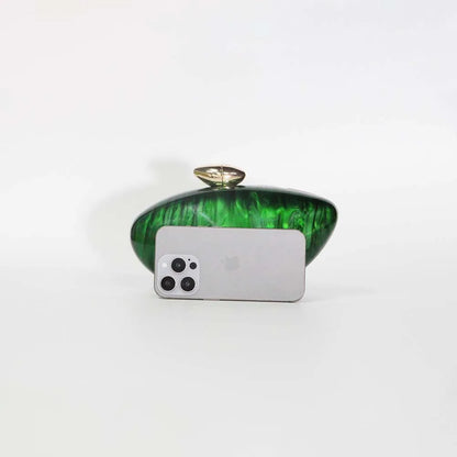 Vibrant green seashell clutch bag with a dreamy pearl acrylic finish, gold hasp closure, and chain strap – perfect for weddings, soirées, and beachside style by Montipi Australia