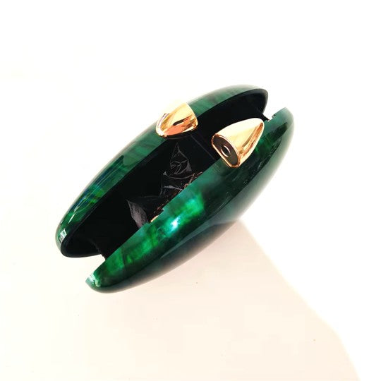 Vibrant green seashell clutch bag with a dreamy pearl acrylic finish, gold hasp closure, and chain strap – perfect for weddings, soirées, and beachside style by Montipi Australia