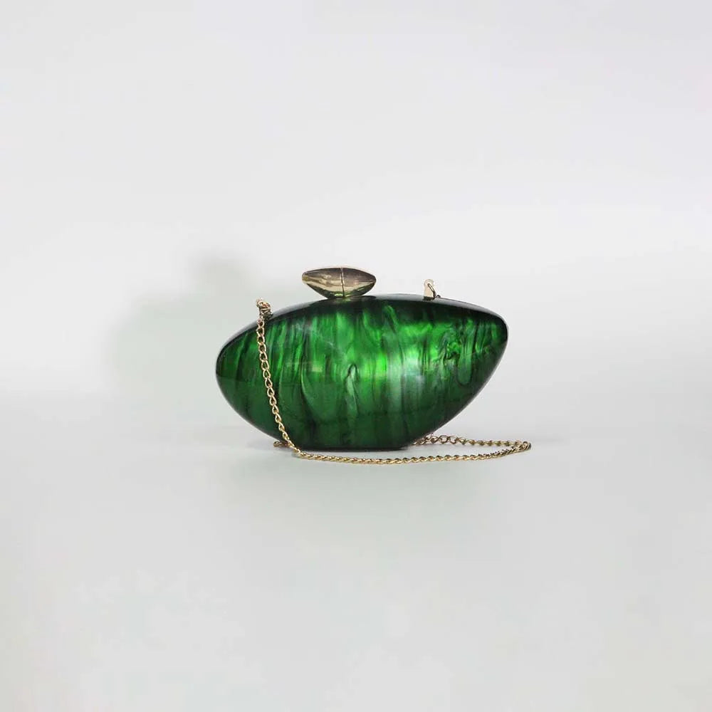 Vibrant green seashell clutch bag with a dreamy pearl acrylic finish, gold hasp closure, and chain strap – perfect for weddings, soirées, and beachside style by Montipi Australia