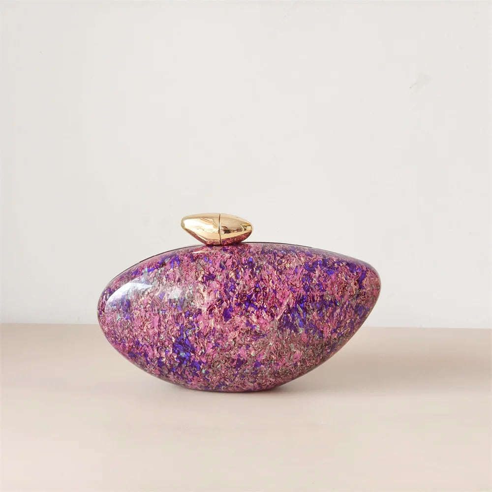 Purple pink mix colour seashell clutch bag with a dreamy pearl acrylic finish, gold hasp closure, and chain strap – perfect for weddings, soirées, and beachside style by Montipi Australia