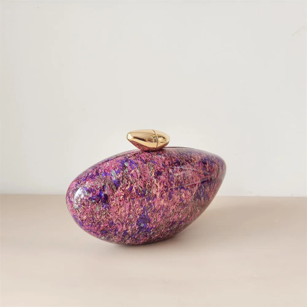 Purple pink mix colour seashell clutch bag with a dreamy pearl acrylic finish, gold hasp closure, and chain strap – perfect for weddings, soirées, and beachside style by Montipi Australia