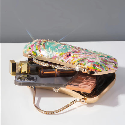Pastel sequin clutch bag with colourful swirling beadwork in pink, mint and spring tones with crystal handle and large interior to fit smart phone and women essentials like lipstick, mirror, tissues and makeup. A whimsical chic clutch with vintage glamour and expressive elegance by Montipi