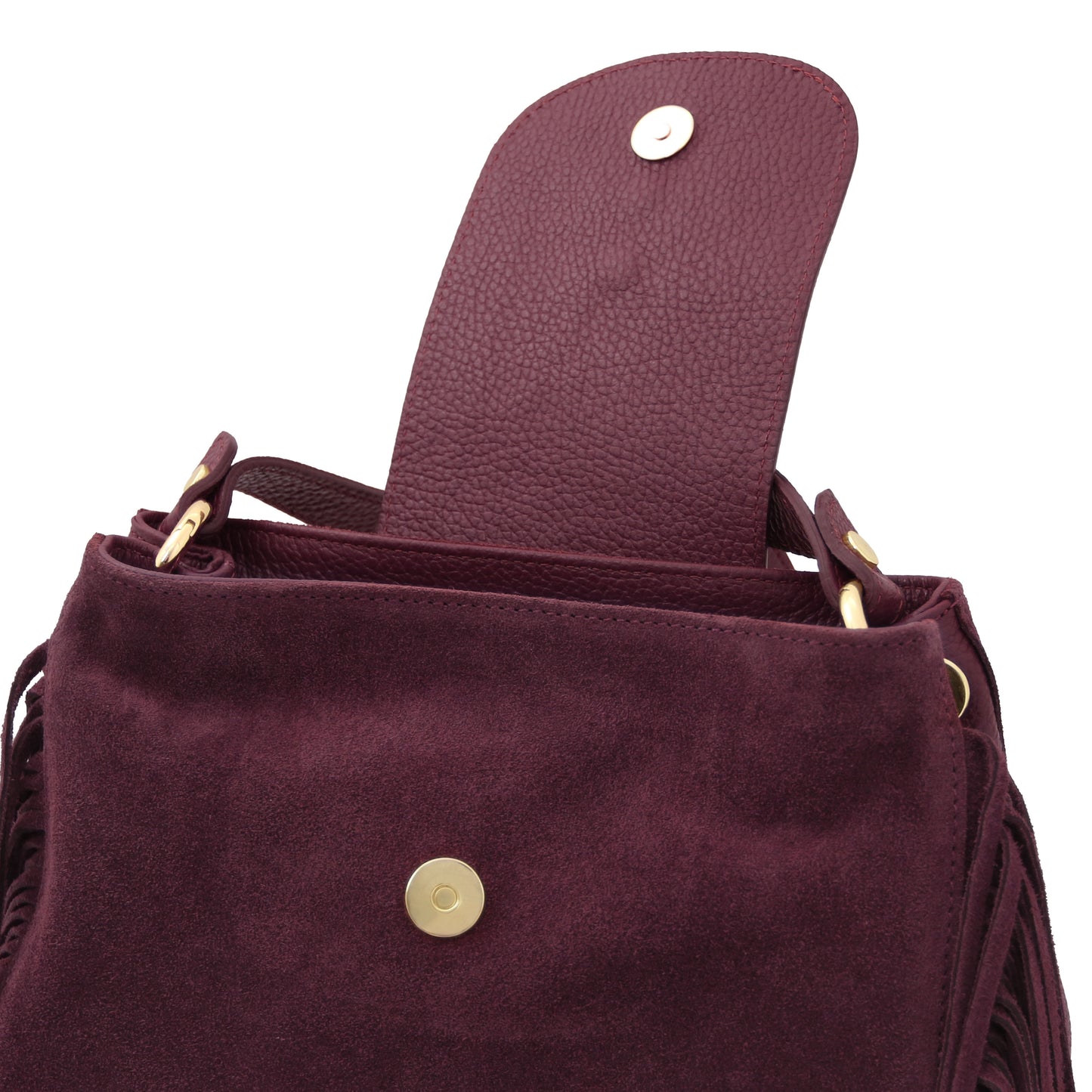 Interior view of the Nomad Burgundy Suede Leather Fringe Bag showing magnetic flap closure, soft beige lining, and refined finish by Montipi.
