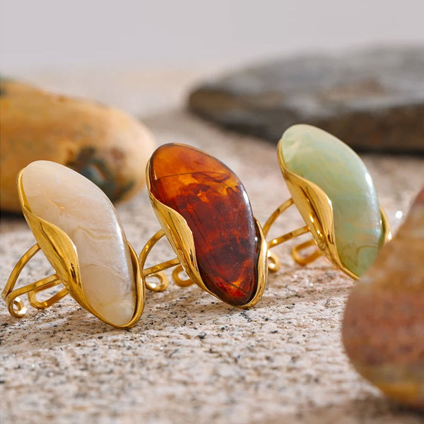 Solara Gemstone Rings in Aqua Green, Amber, and Ivory showcasing sculptural boho luxe style